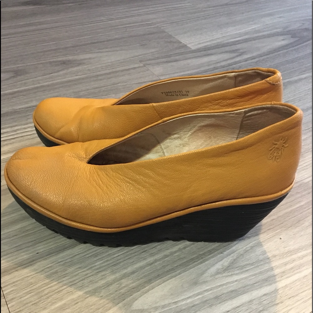 Fly London Gold and Black Stacked Heel Wedge